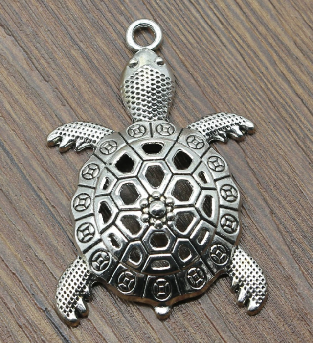 Медальон черепаха